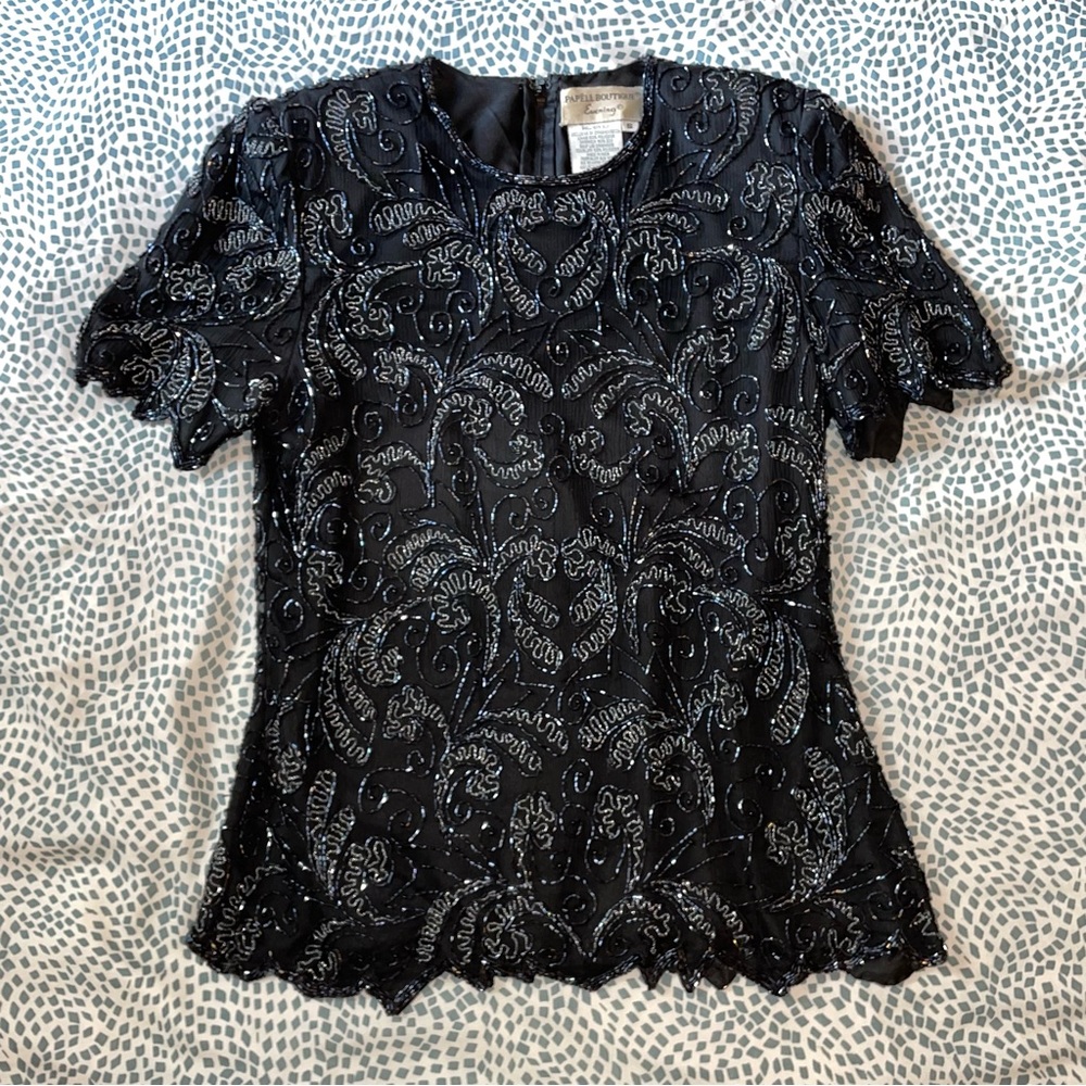 Fancy beaded formalwear top.